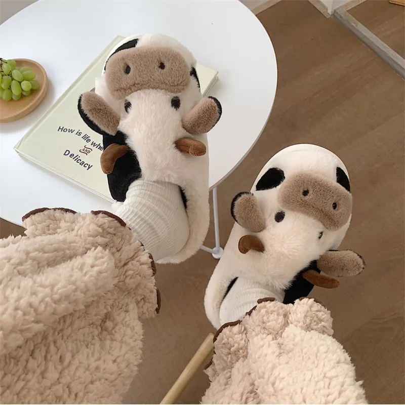 Cow fuzzy slippers